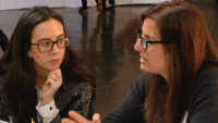 A student talking to a professor.